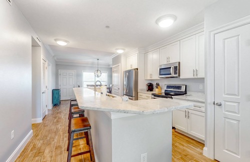 Mexico Beach Condo | Charming stay near the sea with balcony, open layout, smart TVs, & W/D