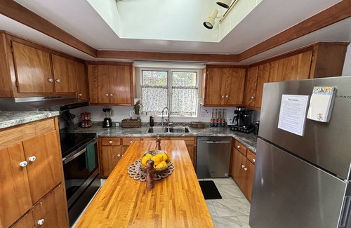 Downtown House | Charming Waterfront Home: Spacious, Modern, Near Attractions & Universities