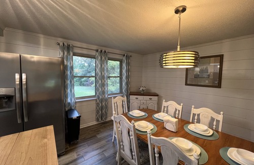 Newton House | Cheerful, relaxing ranch in quiet neighborhood with fire pit