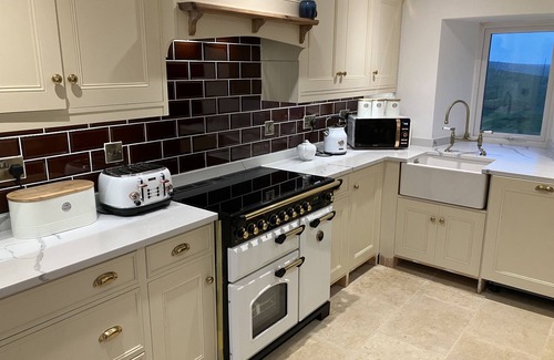 Port Logan Cottage | CHERRY TREE COTTAGE, pet friendly, with a garden in Sandhead