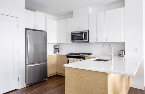 Newtonville Apartment | Chic 1BR w/Gym, W/D, Steps from Newtonville Train by Blueground