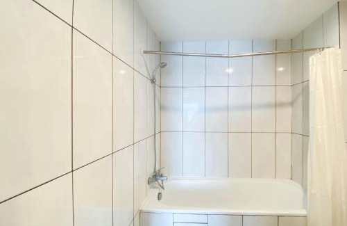 Pekayon Jaya Apartment | Chic and Cozy 2BR Grand Kamala Lagoon Apartment By Travelio