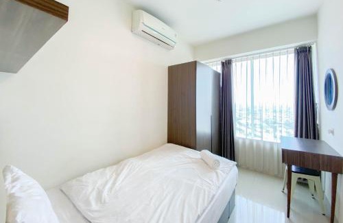 Pekayon Jaya Apartment | Chic and Cozy 2BR Grand Kamala Lagoon Apartment By Travelio