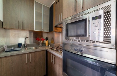 El Golf Apartment | Chic & Cozy 2BR Retreat Your Perfect Getaway Oasis
