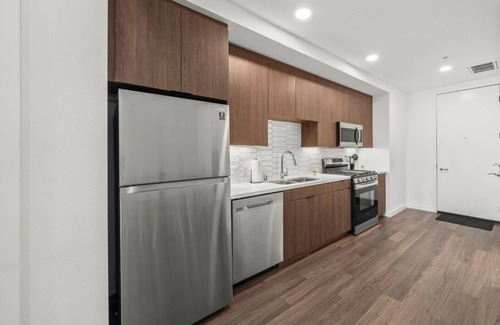 West Gateway Apartment | Chic Downtown Stay + Walk to Beach