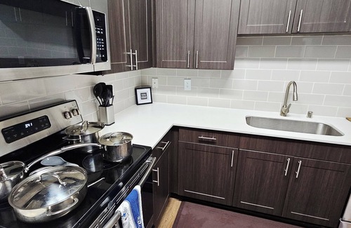 The Colony House | Chic King Bed Townhome Retreat with Pools and two car garage, Gym, Pickleball Ct