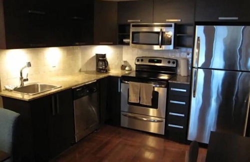 International District Condo | Chic Luxury Downtown Condo with Pool & Garage !n