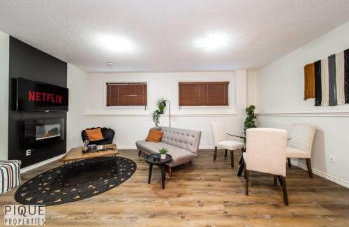 Jasper Place Apartment | Chic Modern Vibes - KING Bed - Fireplace - Sleeps 4 - Wifi
