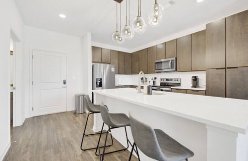 Birmingham Apartment | Chic Oasis w/Pool, Gym, & Stunning City Views