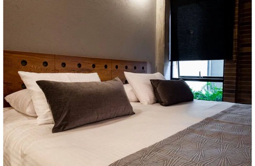 La Candelaria Apartment | Circular Suites 202, 500Mb, AC Smart Tv, Coworking