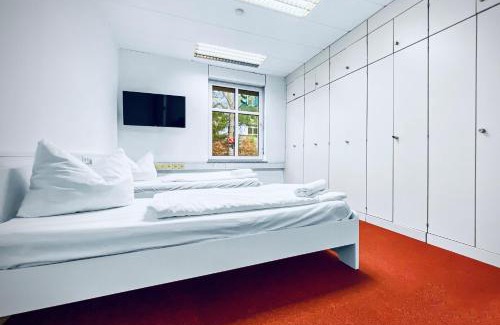 Burbach Apartment | CityChalet Business Apartments - Workers welcome! - Free Parking - Fast WIFI - Smart TV - WM