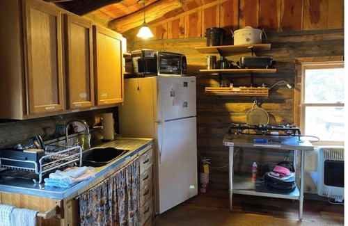 Gulnare House | CJs Ranch RV and Tent sites, with Log Cabin