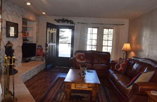 Red River House | Claim Jumper Townhouse 16 - On The River - Across from the Fishing Ponds - In Town - Near The Ski Area - Fireplace - WiFi - Sate