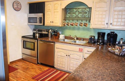 Red River House | Claim Jumper Townhouse 16 - On The River - Across from the Fishing Ponds - In Town - Near The Ski Area - Fireplace - WiFi - Sate