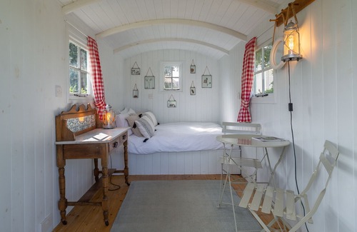 Brandeston Apartment | Clarabelle is a beautiful shepherd's hut set in a blooming kitchen garden