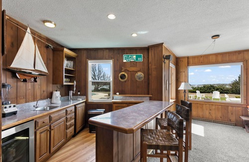 Cataumet House | Classic Cape Cod Home with a Heated Pool, Hot Tub and Spectacular Ocean Views.