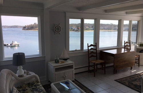 Buzzards Bay House | Classic cape on a hill over looking buttermilk bay