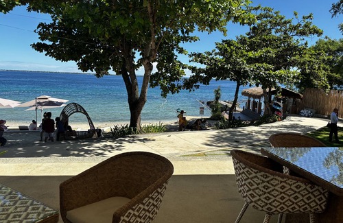 Lapu-Lapu Condo | Clean and cozy ocean view 1BR condo, Mactan, WiFi, pool, private beach