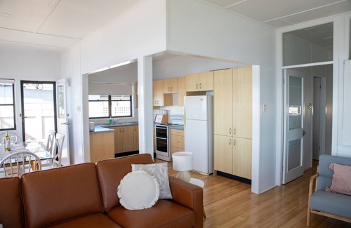 Sunshine Cottage | CLEARVIEW: A feel-good, sunny, north-facing waterfront lake house with jetty