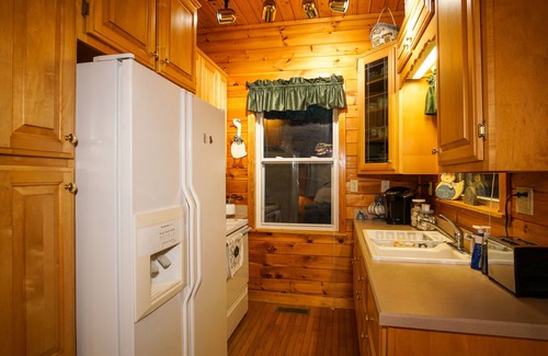 Newport Cabin | Cliffhanging Cabin over French Broad River between Hot Springs, NC and Gatlinburg Tn