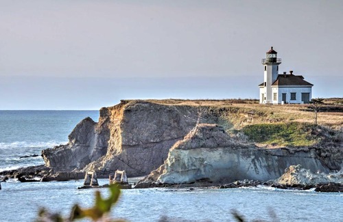 Coos Bay House | Cliffside Lighthouse Beach Home with Ocean View