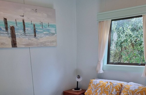 Baylys Beach House | Close to beach in a private location
