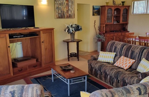 Baylys Beach House | Close to beach in a private location