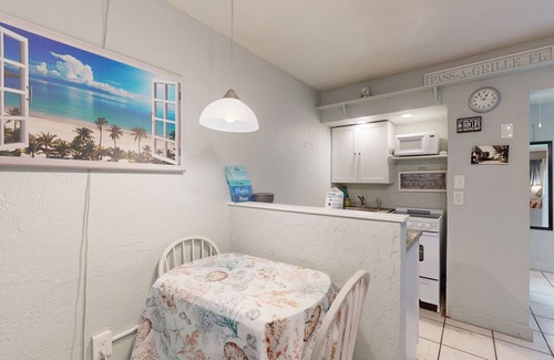Pass-a-Grille Historic District Apartment | Coastal dog-friendly condo with observation deck, best Gulf sunset views