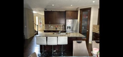 Airdrie Apartment | Coastal Comforts Villa