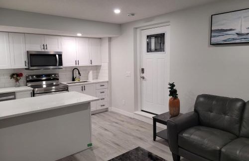 Airdrie Apartment | Coastal Comforts Villa