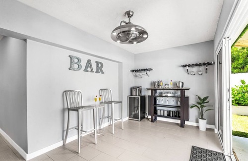 Tropic Palms House | Coastal Delray 🌊 Chill Out Hideaway Lush Vibes🌴 by SaltWater Poolside 4BD