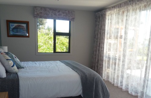 Waiiti House | Coastal gem - prime beachfront home at Waiiti beach.