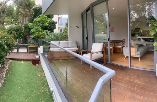 Little Bay Apartment | Coastal Green Living - Short walk to beach, surrounded by parks and golf courses