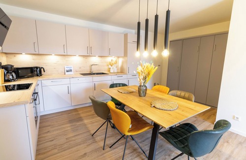 Tossens Apartment | Coastal love - enjoy the North Sea air. Sauna. Roof terrace. Family time.