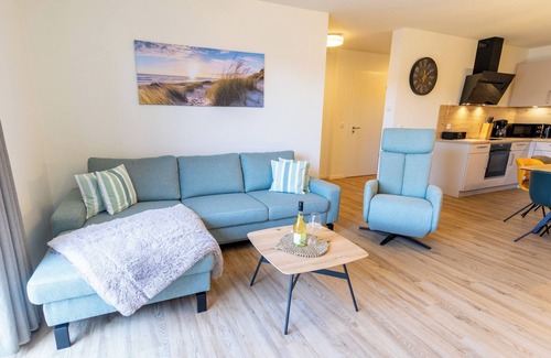 Tossens Apartment | Coastal love - enjoy the North Sea air. Sauna. Roof terrace. Family time.