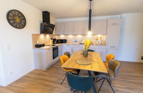 Tossens Apartment | Coastal love - enjoy the North Sea air. Sauna. Roof terrace. Family time.