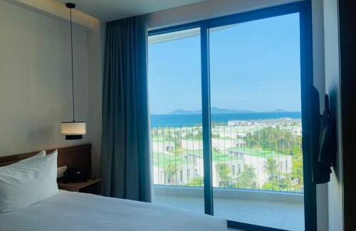 Dien Duong Apartment | Coastal Vibe - Resort 2BR apartment Pool & Beach