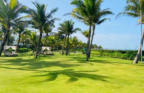 Dien Duong Apartment | Coastal Vibe - Resort 2BR apartment Pool & Beach
