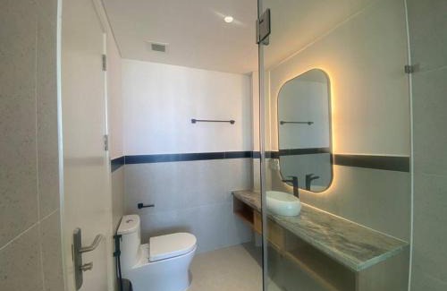 Dien Duong Apartment | Coastal Vibe - Resort 2BR apartment Pool & Beach