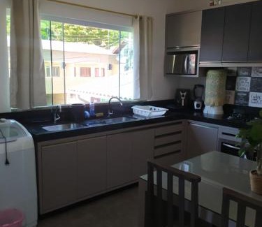 Canto Grande Apartment | Com uma linda vista para o mar, á 30m da praia.