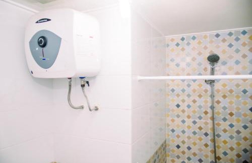 Pluit Apartment | Comfort 1BR with Wardrobe Room at Green Bay Pluit Apartment By Travelio