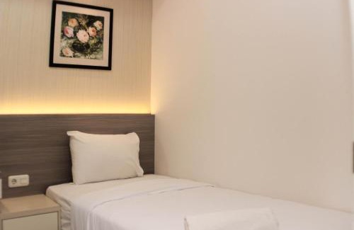 Pekayon Jaya Apartment | Comfort 2BR at Grand Kamala Lagoon Apartment By Travelio