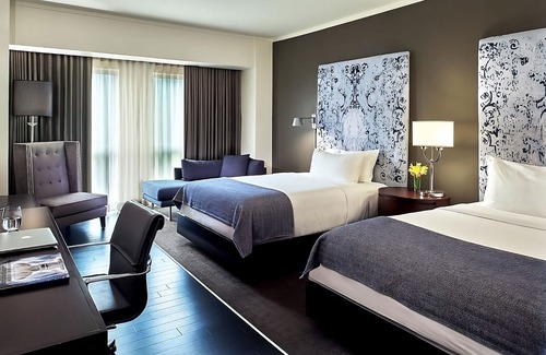 West Plaza Hotel | Comfort and Convenience! 2 Pleasant Units, Pool, Pets Allowed Near Crown Center!