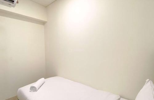 Cikarang Apartment | Comfortable 2BR with Working Room at Meikarta Apartment By Travelio