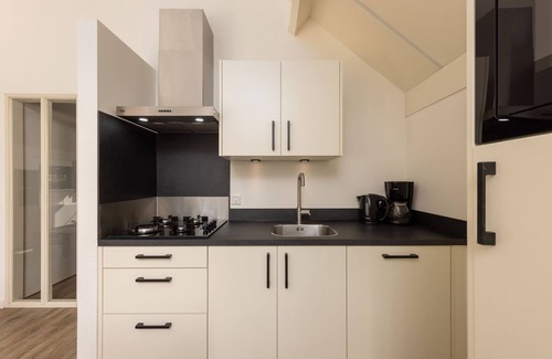 Hoge Hexel House | Comfortable bungalow with a combi microwave, in green Twente