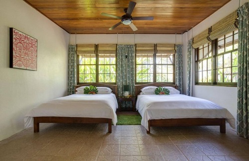 Negroman Resort | Comfortable Casita w/Private Bath, Screened Porch, & A/C - Near Treehouse Bar