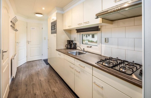 Hooghalen House | Comfortable chalet with 3 bedrooms, kitchen, WiFi, TV, and terrace.
