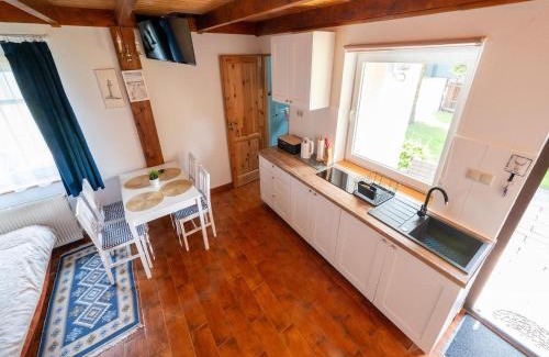 Darlowo House | Comfortable holiday homes with a summer pool