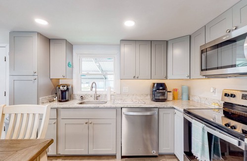 Montego Bay House | Comfortable home near beach with screened porch, pool, tennis, & mini-golf