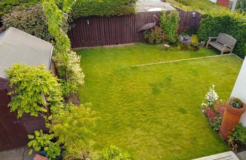 Longcroft House | Comfortable room with en suite
